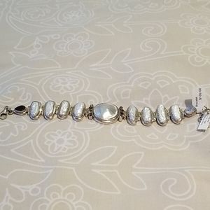 Bracelet with pearl-like stones and other stones